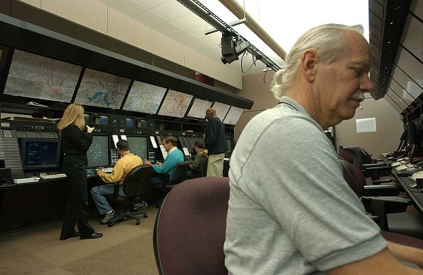 Air route traffic controllers at work at the Washington ARTCC.